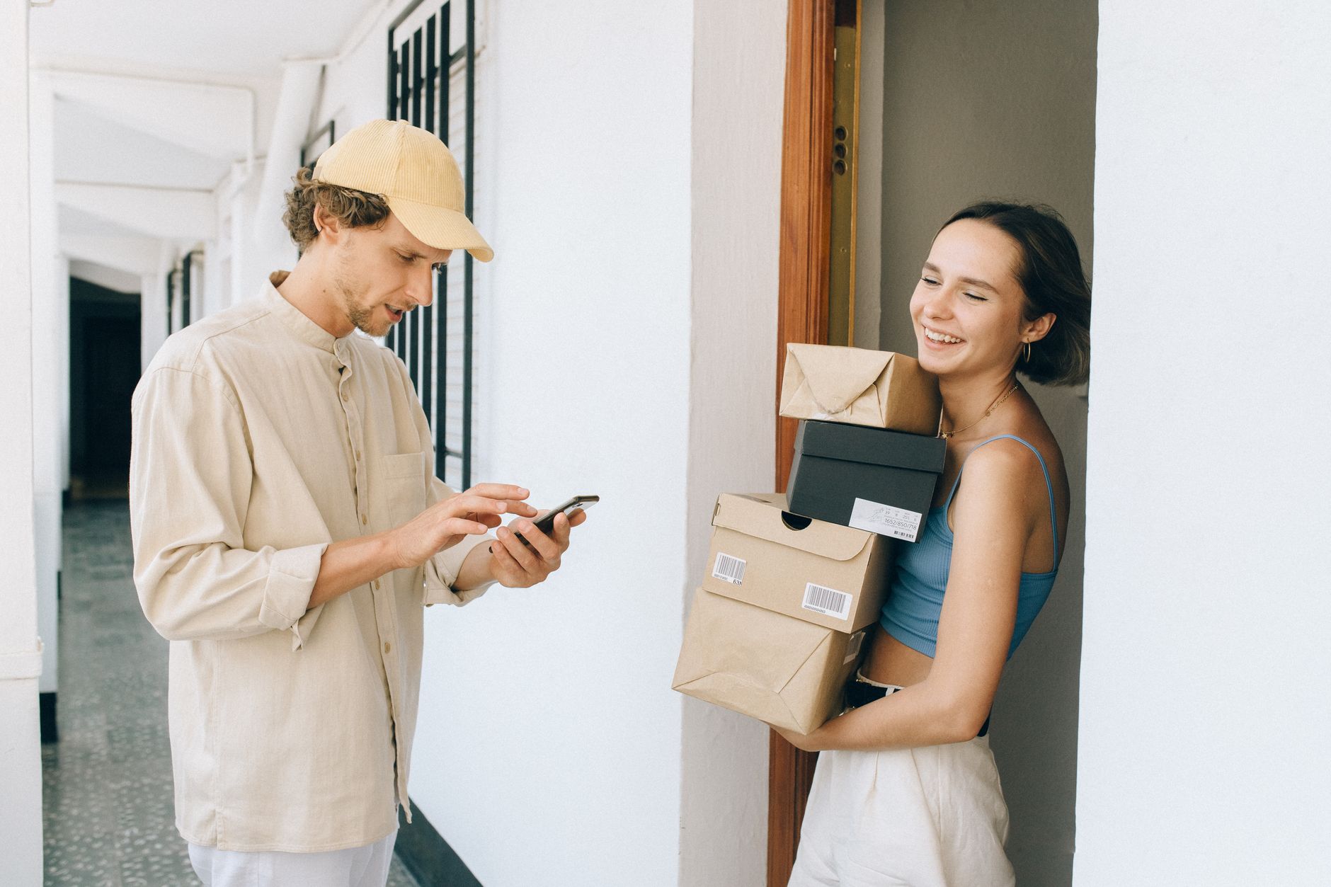 Clothing return parcels stacked in a courier van illustrating the environmental cost of fast fashion returns UK